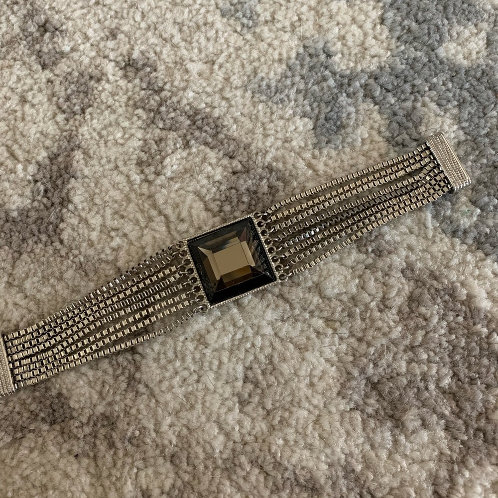 Silver bracelet with black centrepiece